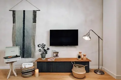 a bedroom with a large bed and a window at Arros - 2 bedroom in El Born in Barcelona