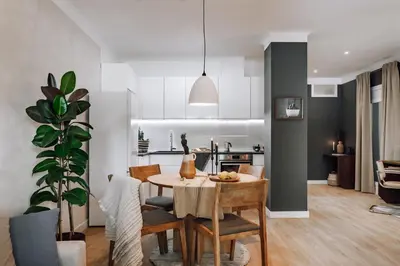 a bedroom with a large bed with a large wooden headboard at Arros - 2 bedroom in El Born in Barcelona