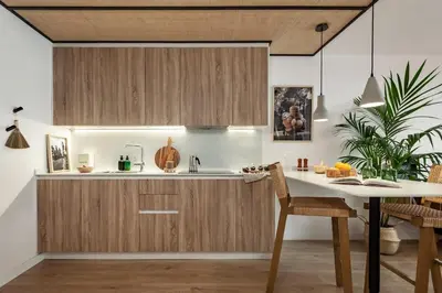 a bedroom with a large bed with a tray on it at Bintan - 1 bedroom and terrace in Gràcia in Barcelona