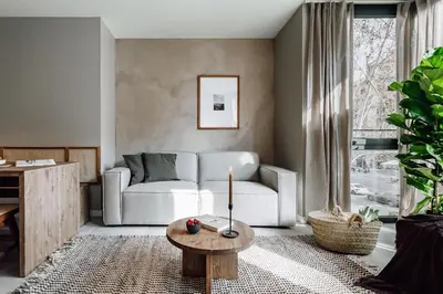 a kitchen with a table and chairs in a room at Encina - 2 bedrooms in Eixample Esquerra in Barcelona