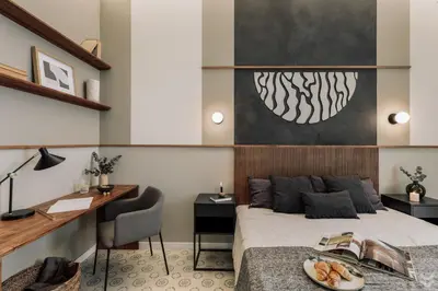 a kitchen and living room with an archway and a dining room at Halite - 2 bedrooms, terrace, and balcony in Gràcia in Barcelona