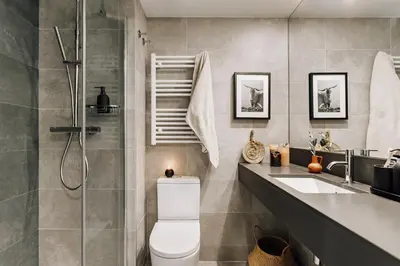 a bedroom with a white bed and a window at Taull - 3 bedrooms in Eixample Esquerra in Barcelona