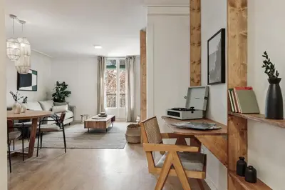 a kitchen with white cabinets and a sink and a dishwasher at Canet - 1 bedroom in Ciutat Vella in Barcelona