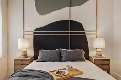 a bedroom with a bed and a lamp on a table at Yaz - 2 bedrooms and balcony in El Putxet in Barcelona