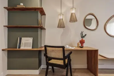 a living room with a couch and a table at Yaz - 2 bedrooms and balcony in El Putxet in Barcelona