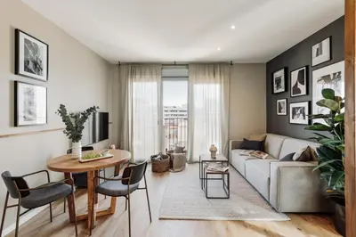 a bedroom with a large bed and a window at Roc - 2 bedrooms in Poblenou in Barcelona