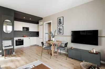 a kitchen with white cabinets and a sink at Roc - 2 bedrooms in Poblenou in Barcelona
