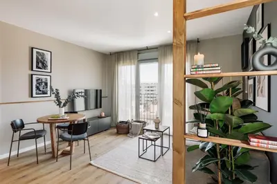 a bedroom with a bed and a desk at Roc - 2 bedrooms in Poblenou in Barcelona