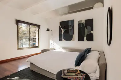 a bedroom with a bed and a couch at Enjoy Apartments Urban Retreat Valencia 3 in Barcelona
