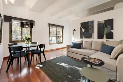 a living room with a couch and a table at Enjoy Apartments Urban Retreat Valencia 3 in Barcelona