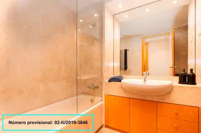 a bathroom with a sink and a shower at Enjoy Apartments Calle Paris Super Stylish II in Barcelona