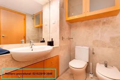 a bathroom with a sink and a toilet at Enjoy Apartments Calle Paris Super Stylish II in Barcelona