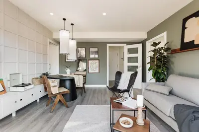 a living room with a couch and a chair at Oreneta - 1 bedroom and pool in Les Corts in Barcelona