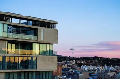a building with a view of a city at Apartments BCN Central-Atico Sants in Barcelona