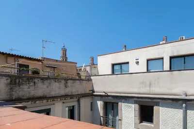 a view of an apartment building from a rooftop at AinB Born-Dames Apartments in Barcelona