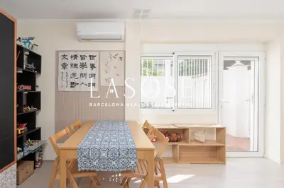 a dining room with a table and chairs at Vacation house with garden in the foothills in Barcelona