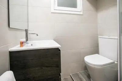 a bathroom with a sink and a toilet at E4lle1031 - Studio next to Plaza Espanya in Barcelona