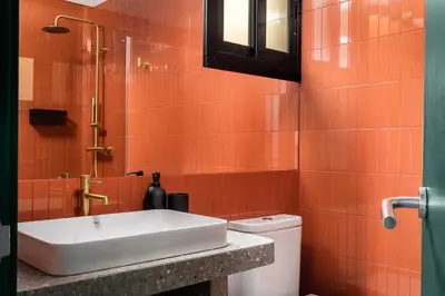 a bathroom with a sink and a toilet at BYPILLOW Twenty in Barcelona