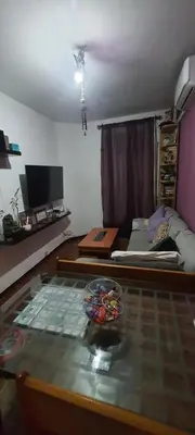 a living room with a glass table and a couch at Estudio, privado e independiente in Hospitalet de Llobregat