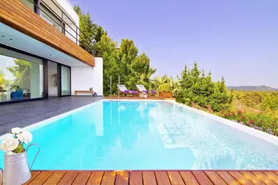 a swimming pool in the backyard of a house at Holiday Home Alexander Plana in Pallejá