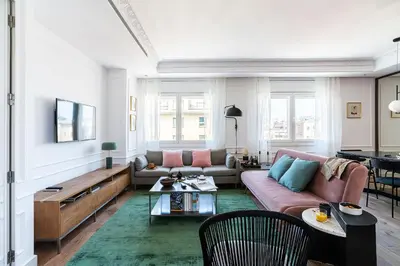 a living room with a couch and a table at Rental Apartment Barcelona in Barcelona