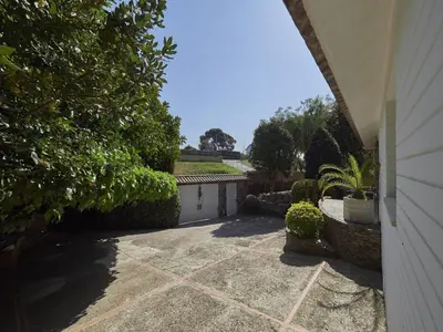 a driveway leading to a house with a garage at Villa Julia | 14pax. 5' sea & train in Sant Andreu de Llavaneres