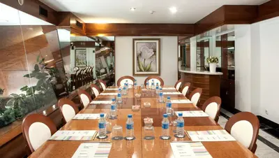 a long table in a room with chairs at Acacia Suite in Barcelona
