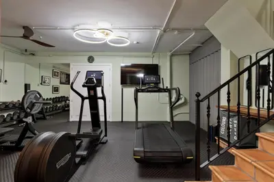 a gym with two treadmills and a treadmill at Chez Pablo Barcelona in Cabrils