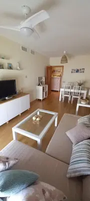a living room with a couch and a table at Piso in Hospitalet de Llobregat
