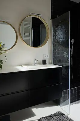 a bathroom with a sink and a mirror at Villa Sitges Casa Selva 7 minutos de Sitges en coche Diseño Comodidad Nueva Ideal para Vacaciones in Sant Pere de Ribes