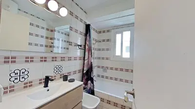 a bathroom with a sink and a mirror at For Sea Lovers in Cubelles