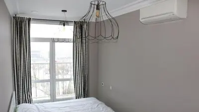 a bedroom with a bed and a large window at Casa o chalet independiente en venta en Sarrià in Sant Just Desvern