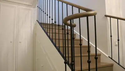 a staircase with a wooden rail and a stair case at Casa o chalet independiente en venta en Sarrià in Sant Just Desvern