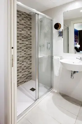 a bathroom with a shower and a sink at Hotel BESTPRICE Gracia in Barcelona