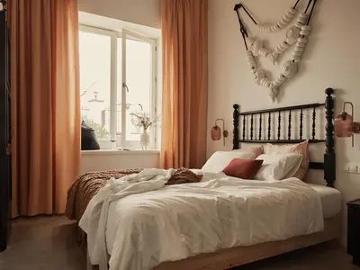 a bedroom with a bed and a window at Soul Farm Mas els Igols in Torrellas de Foix