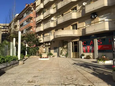 an empty street in front of a building at Perfect Apartment near the beach and Barcelona in Pineda de Mar