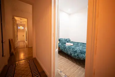 a hallway with a bed in a room at Stylish Retreat in Catalonia in Barcelona