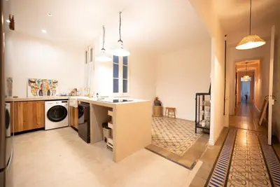 a kitchen with a washer and dryer at Stylish Retreat in Catalonia in Barcelona