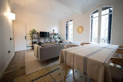 a living room with a bed and a couch at Stylish Retreat in Catalonia in Barcelona