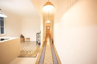 a hallway with a tile floor and a hallway with at Stylish Retreat in Catalonia in Barcelona