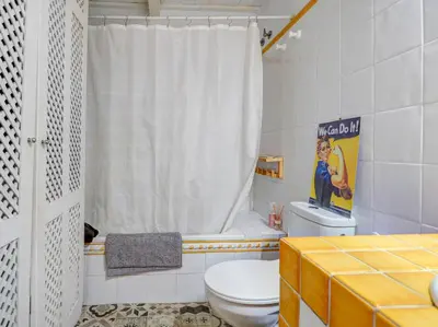 a bathroom with a toilet and a shower at Masia Las Torres by Hello Homes Sitges in Sitges