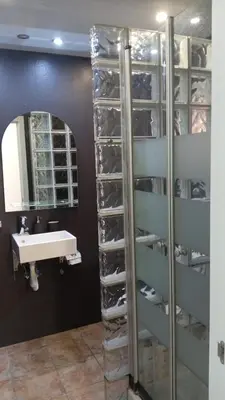 a bathroom with a sink and a shelf with shoes at SA 15min downtown Barcelona, 5min Metro, Beach nearby in Sant Adria de Besos