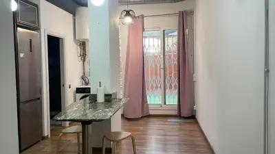 a room with a table and a glass counter top at SA 15min downtown Barcelona, 5min Metro, Beach nearby in Sant Adria de Besos