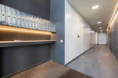 a hallway of a building with a stair case at CATERINA Bac de Roda in Barcelona
