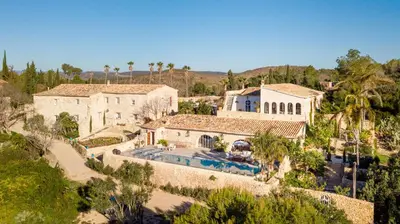 an aerial view of a house with a swimming pool at Alcazar Del Garraf in Olivella
