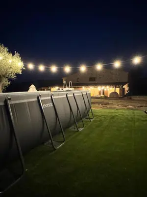 a row of barriers in a field at night at Ca l'Esclatat in Santa María de Palautordera