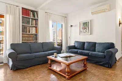 a living room with two couches and a coffee table at 180m² 5BR Home Lift Terrace 32 Nights in Barcelona