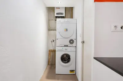 an open door of a building with a window at Historic El Born 2BR Monthly Stay Workspace in Barcelona