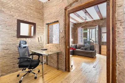a bathroom with a toilet and a sink at Historic El Born 2BR Monthly Stay Workspace in Barcelona