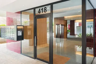 an open glass door of a building with at Diagonal Mar Monthly 2BR Pools Parking in Barcelona